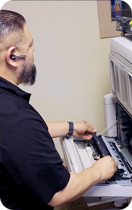 Man looks at computer
